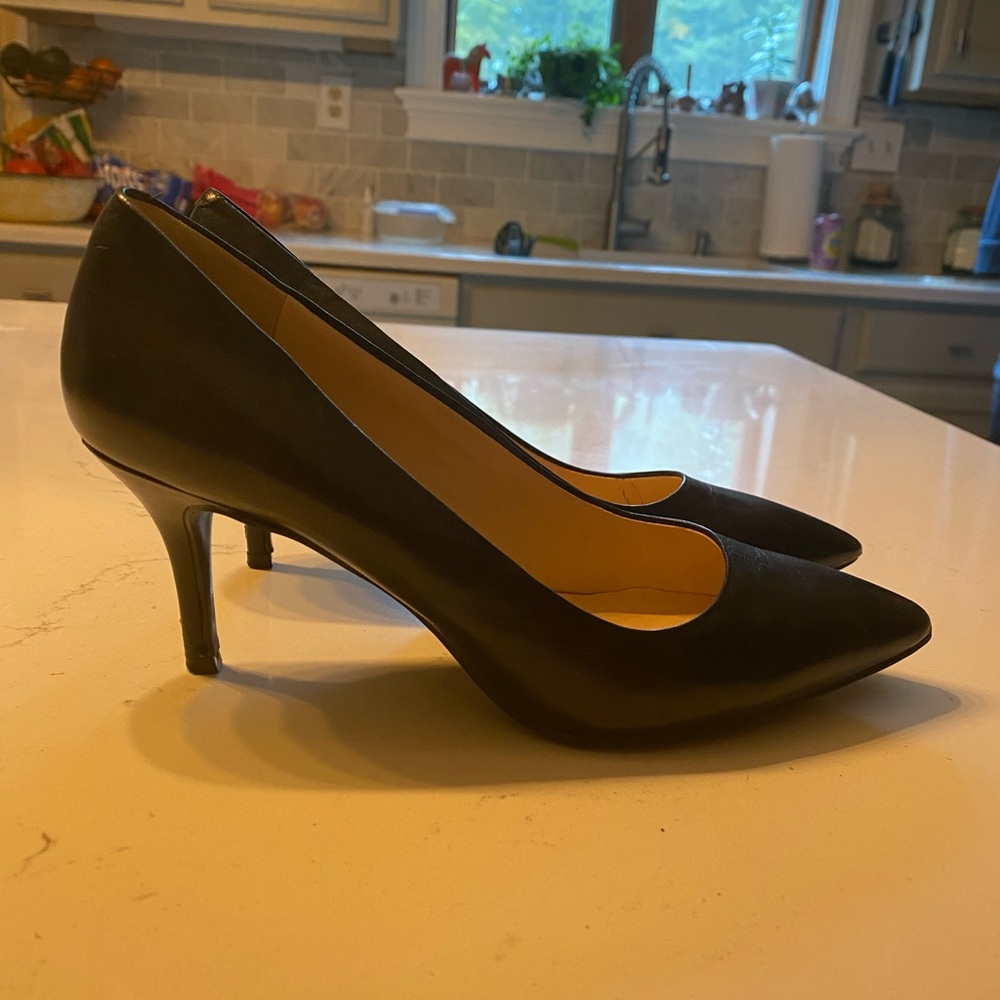 Nine West black leather pump high be size 6.5